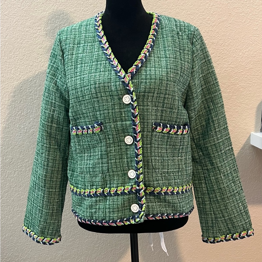 Vintage tweed fabric jacket with clover buttons and liner. Pristine condition!
